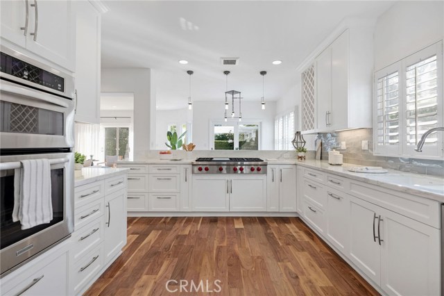 Large Kitchen Opens to Sunny Back Yard