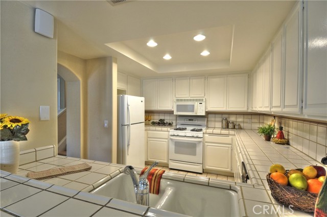 Bright white kitchen with pantry