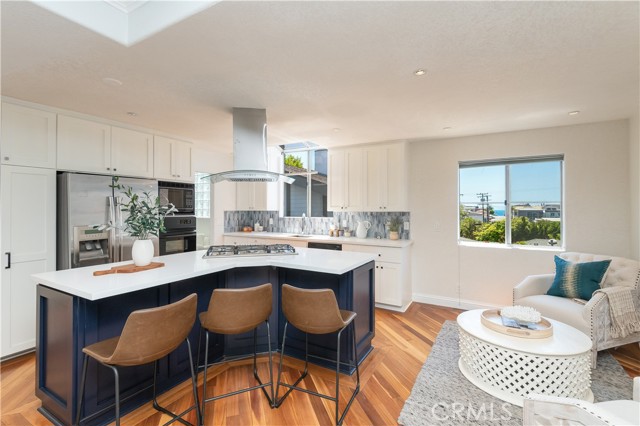 Open floorplan in the kitchen with plenty of room for a dining room table and seating.