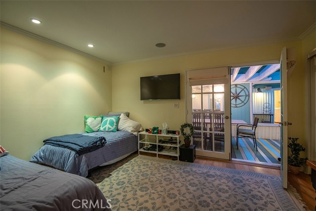 Main floor bedroom, opens onto outdoor patio