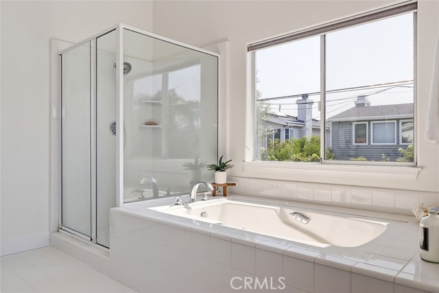 2ND FLOOR MASTER BATHROOM WITH SEPARATE GLASS ENCLOSE SHOWER STALL & BATHTUB