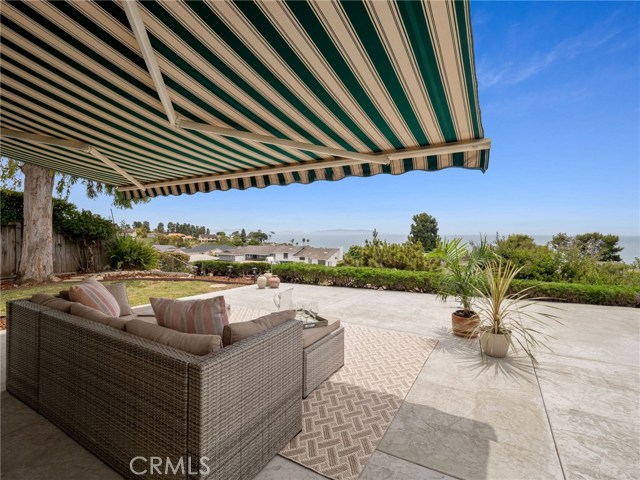 One more angle of patio and awning and part of grass side yard