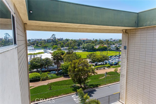 This is a top floor corner unit, next to the breezeway. The master bedroom window is on the left.