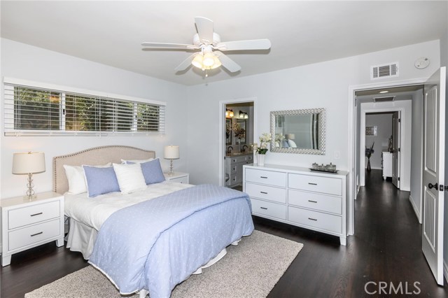 Large guest bedroom with access to hallway bathroom.