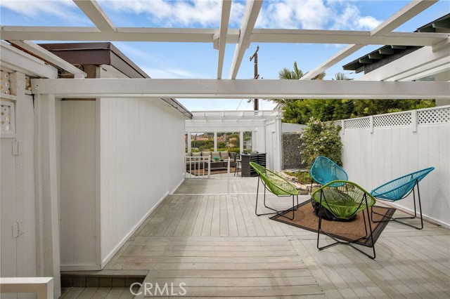 Private deck and patio areas are just outside of the family room