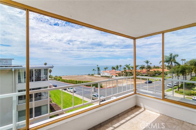 Porch affords outdoor dining and BBQ area to enjoy the view.