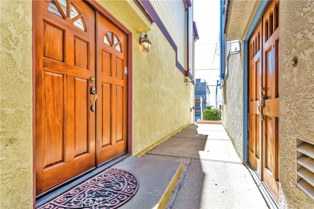 A walk down the private sideyard leads to the front door entry