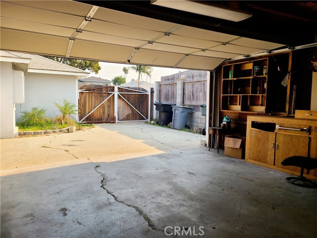 Gated Driveway & Detached Garage w/ Built-In Work Bench Gated Driveway & Detached Garage w/ Built-In Work Bench