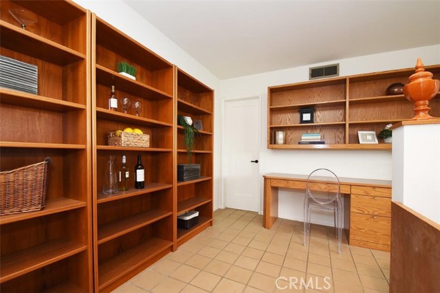 Family Room with Desk & Bookshelves