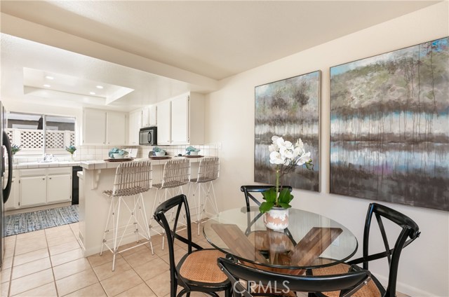 Dining, breakfast bar and kitchen