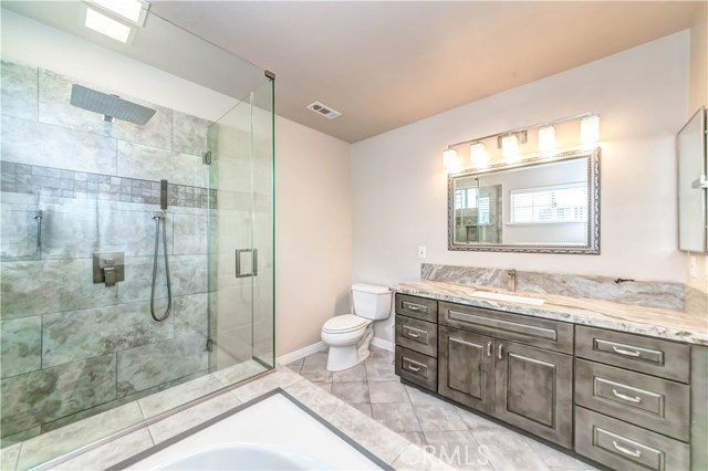 Fully remodeled master bath and glass shower stall with NO spotted water stains