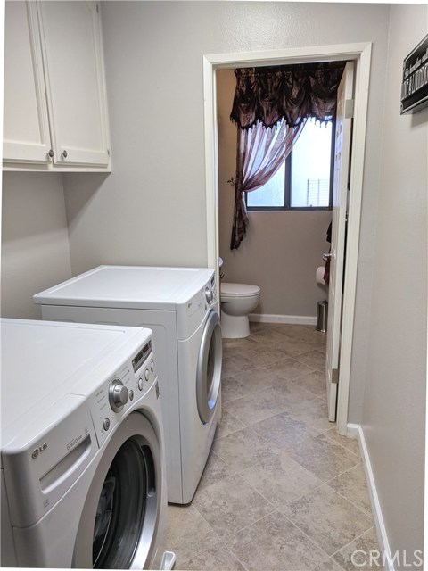 1/2 Bath at end of Laundry Room