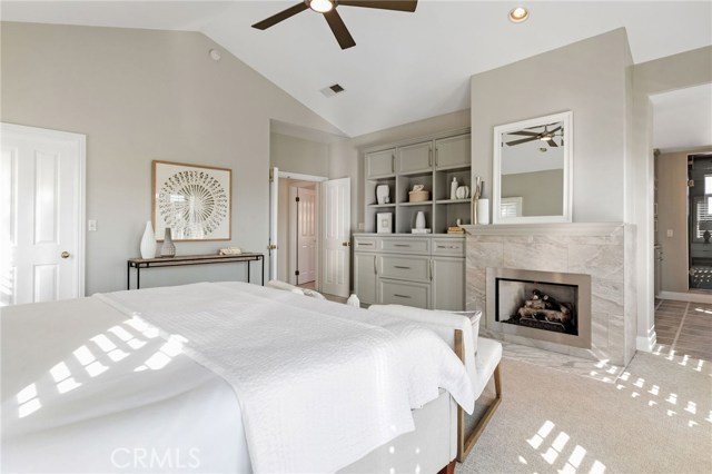 Primary Bedroom with Fireplace and Custom Built-in Cabinetry
