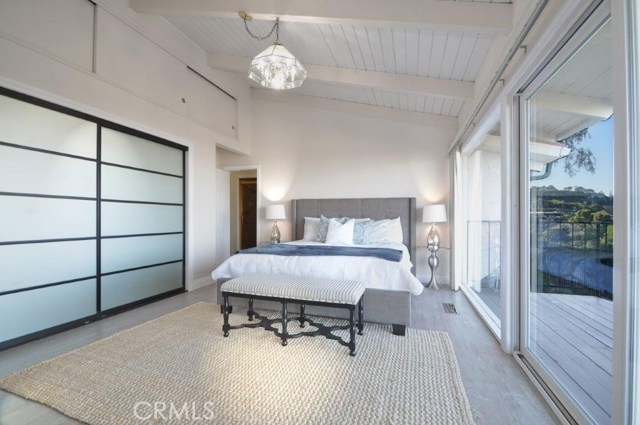 Master Bedroom has High Ceiling & Opens to the Balcony