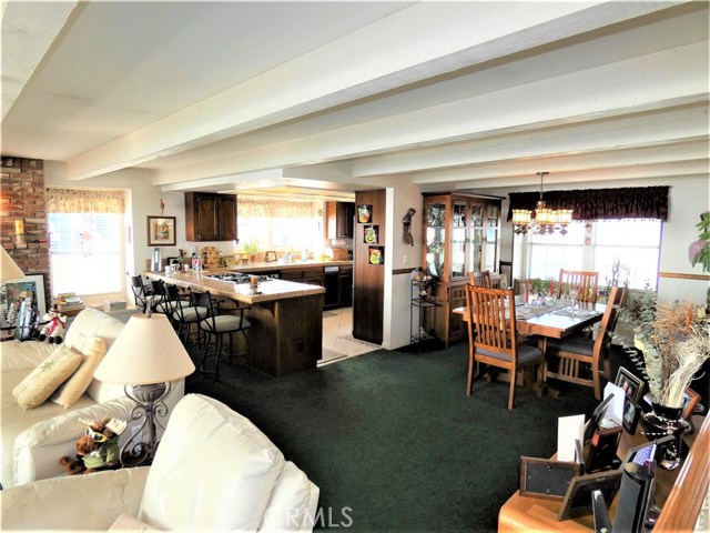 Open floorplan for Kitchen, dining & living rooms all with panoramic ocean views!