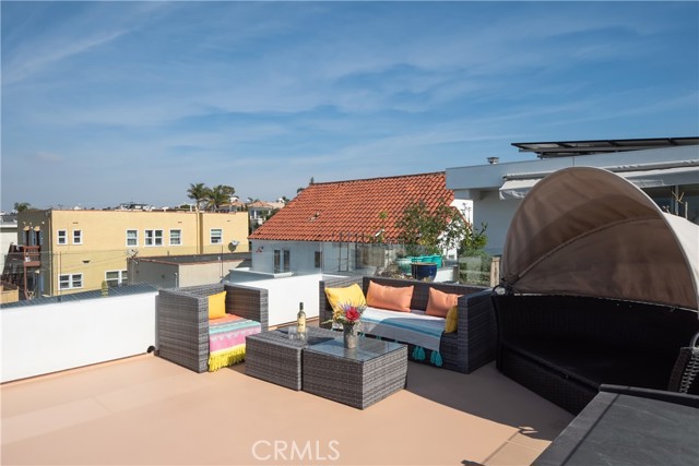 Lots of space on the rooftop deck to create your own beach retreat.