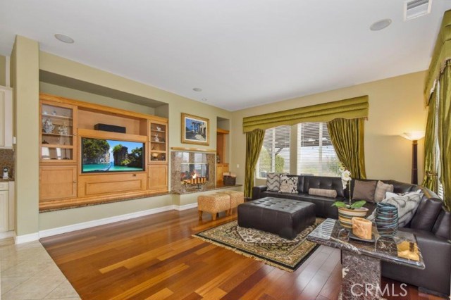 Spacious Family Roomwith Built In Cabinets