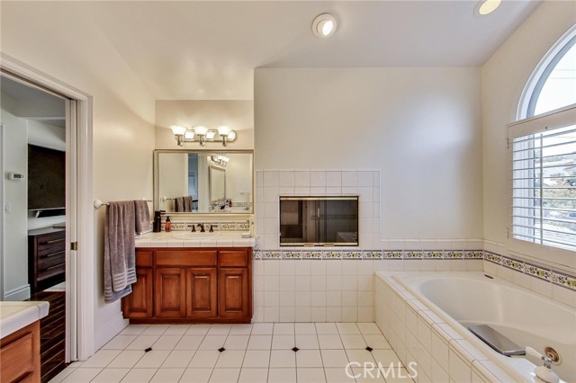 Looking thru fireplace into bedroom. Picture taken from closet opening (next shot).