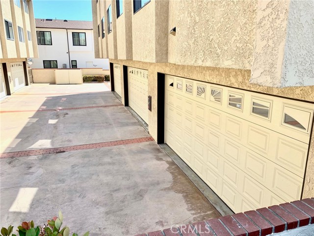 Rear of the condo, garage.