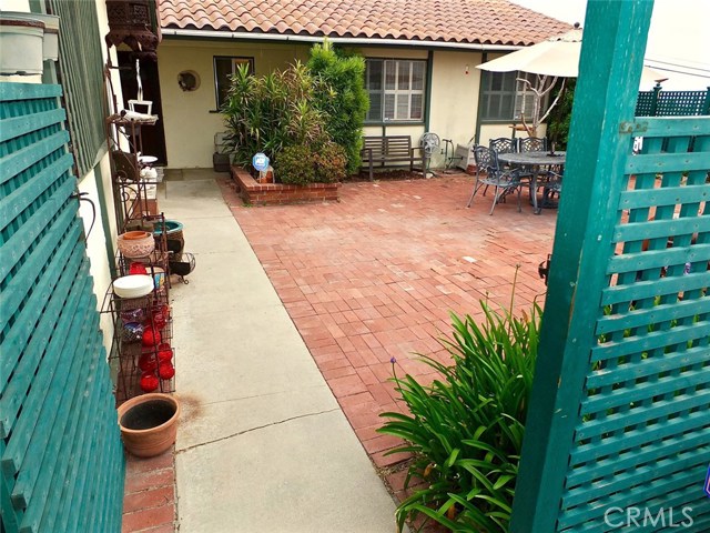 Front Entrance to Charming Brick Patio