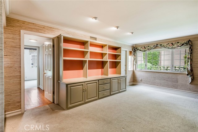 Family room with bar and built ins