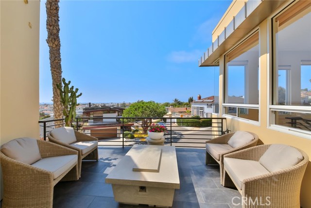 fire pit and seating with ocean views