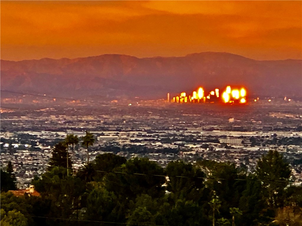 I just discovered this View on 1/7/2020. The Sunset at Santa Monica Ocean reflecting on the glass windows of the buildings in City of Los Angeles (around 5:00PM)