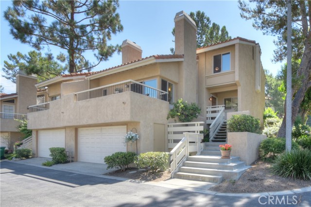 Move-In Ready 3 bed 2.5 bath end-unit townhome located in the beautiful tree lined La Mancha... Primary Photo for Listing #OC17172778