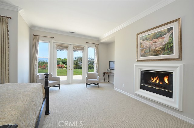 Master Bedroom with Sitting Area & Fireplace
