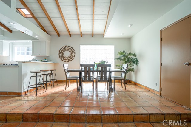 Dining room is FULL of light, with skylights too!