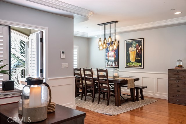 Dining area open to family room and adjacent to outdoor patio/deck.