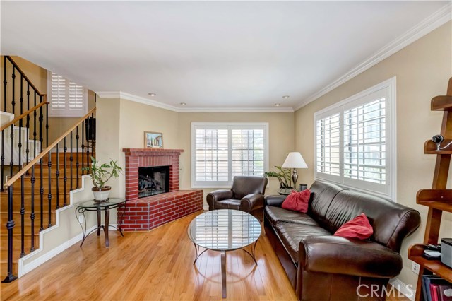 LED lighting, plantation shutters, wood floors, gas fireplace