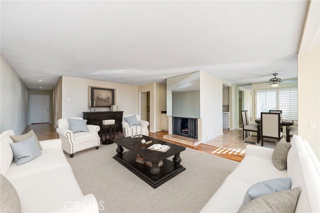 Bright and Open Living area with Dining room all with ocean views - Virtually staged.