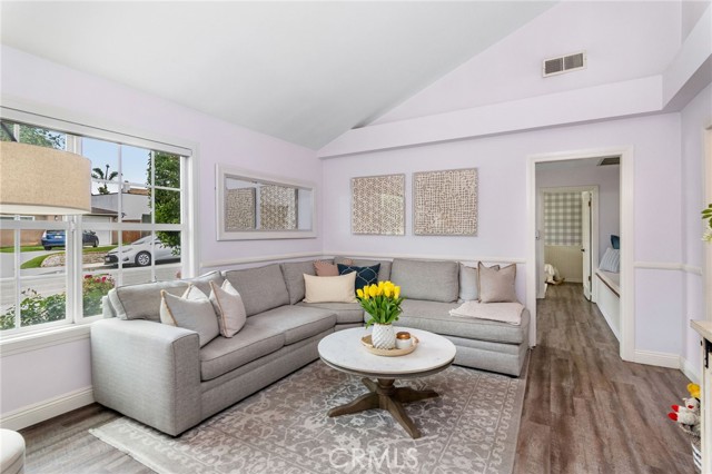 Living Room has high ceilings and is warm and inviting