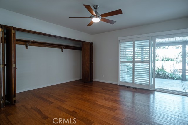 Master bedroom leads to patio and backyard