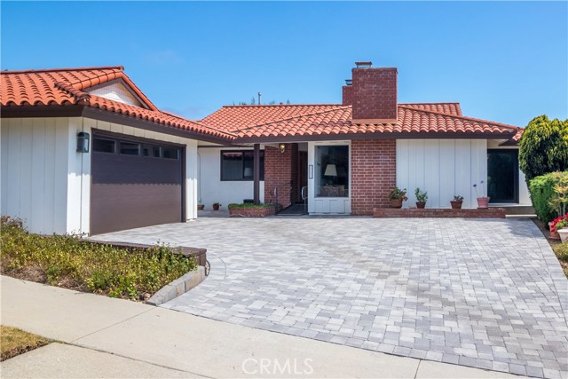 Stone paver driveway with detached two car garage on Via Lorado