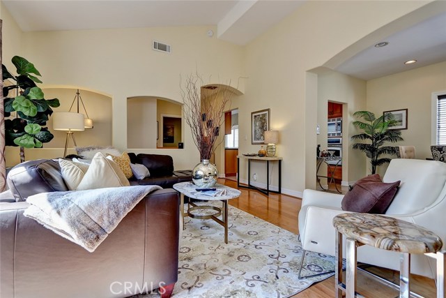 Light, bright and open floor plan from the formal living room to the kitchen and dining area.