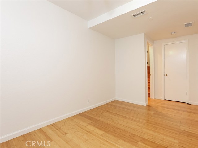 Downstairs bonus room with closet and stair access
