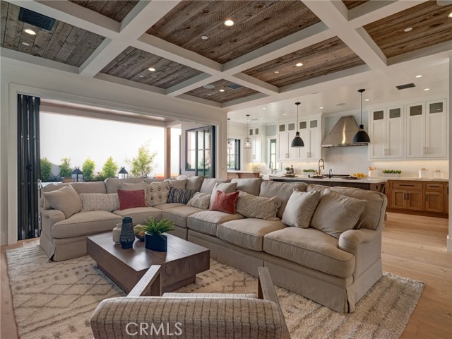 Trestlewood reclaimed wood accents, whole home surround sound, white oak flooring, LaCantina door systems.