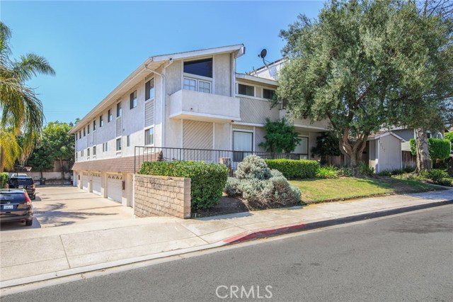 front of building, plenty of street parking plus 2 car garage & 1 parking spot in driveway