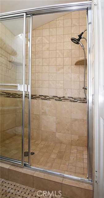 Travertine tiled stall shower in Bathroom #1