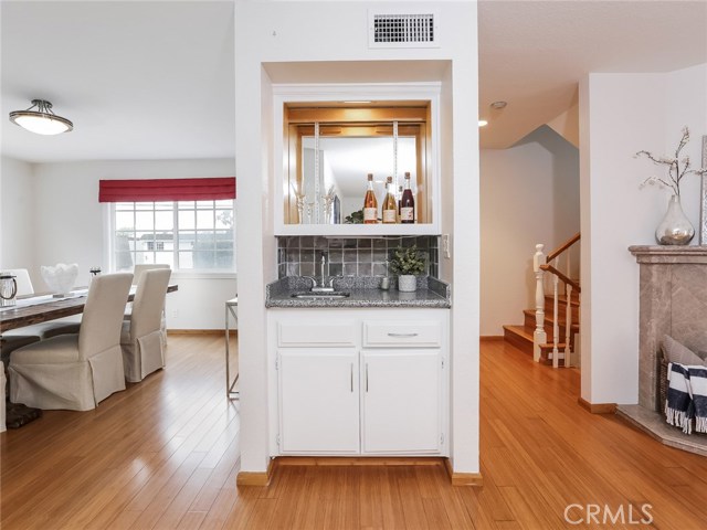 Wet bar, dining room and hall access to stairs