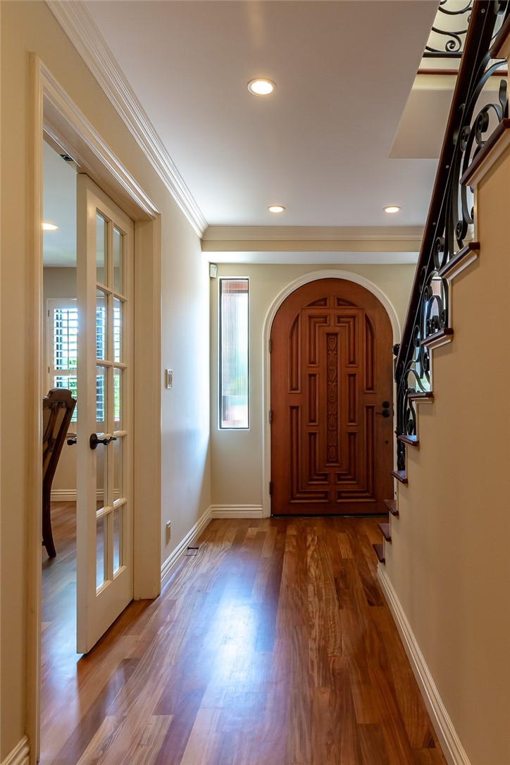 Front hallway.  French doors to the left lead to office