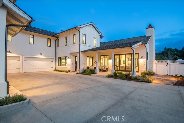 Huge motor court with 3-car garage