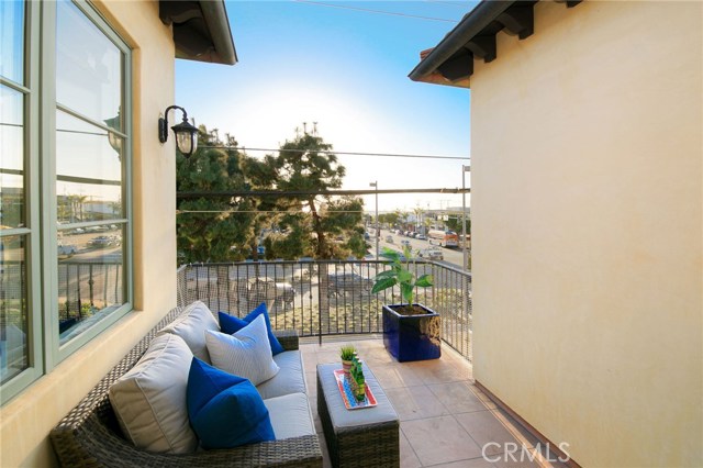 Outdoor deck with ocean, sunset and downtown Manhattan Beach views