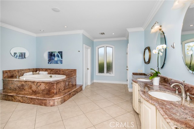 Master bath with his and hers sinks