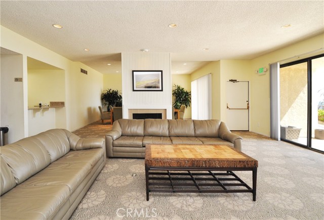 Club House Fireplace. Pool, Golf Course and Ocean Views