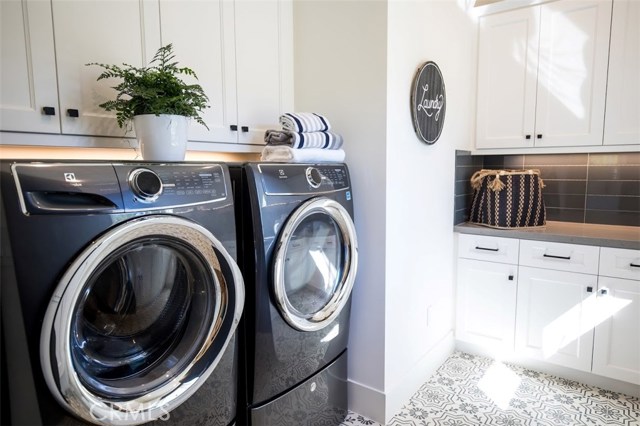 Laundry room (appliances not included) of A3 floorplan. Model home shown.