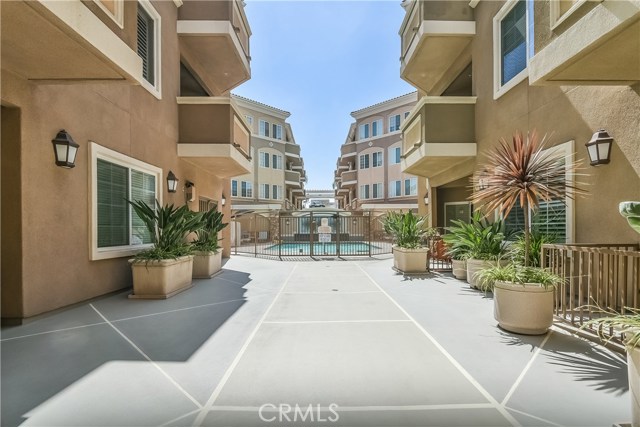 Lovely court yard area leading to pool.