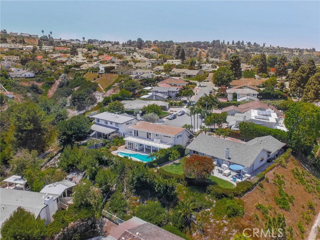 4801 Falcon Rock Pl is the home in the middle with the pool.